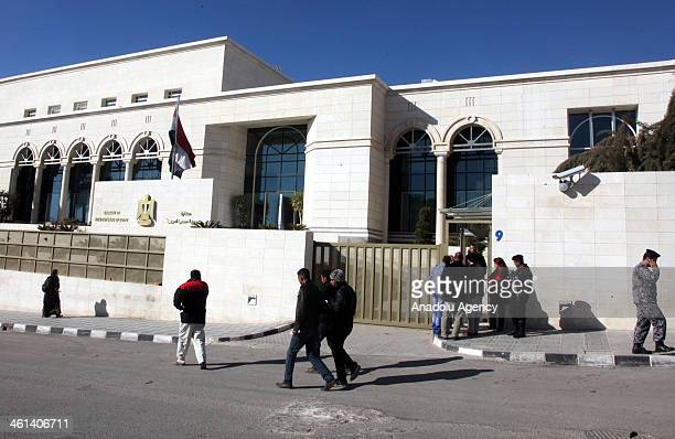 AMMAN, JORDAN - JANUARY 8:  Egyptians are seen in front of the Egyptian Embassy in Amman during the voting for Egypt constitution referendum on January 8, 2014 in Amman, Jordan. Egyptians living in Amman vote for Egyptian constitution referendum. (Photo by Shadi Alnsoor/Anadolu Agency/Getty Images)